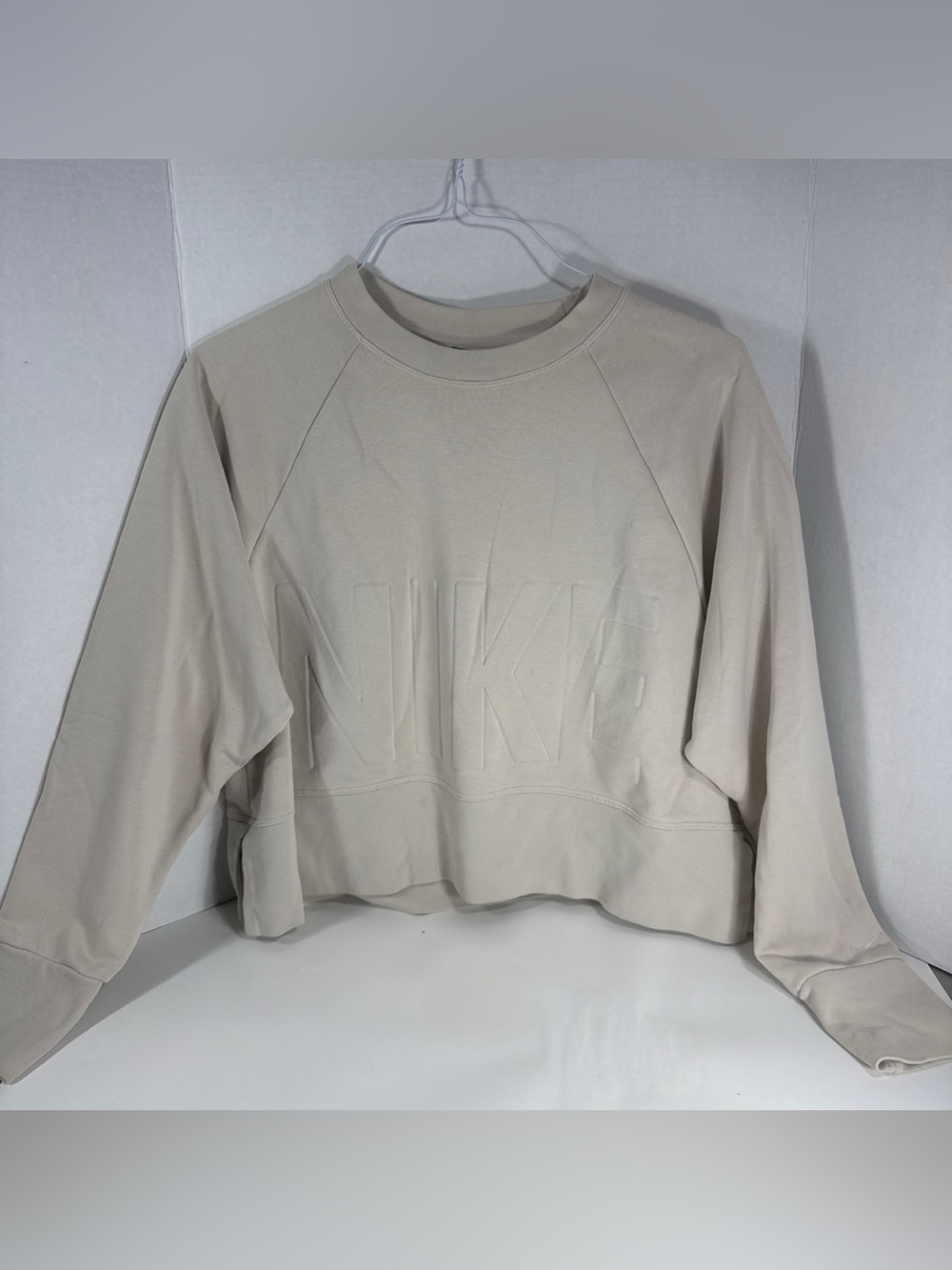 Nike Women's Beige Embossed Logo Crewneck Sweatshirt